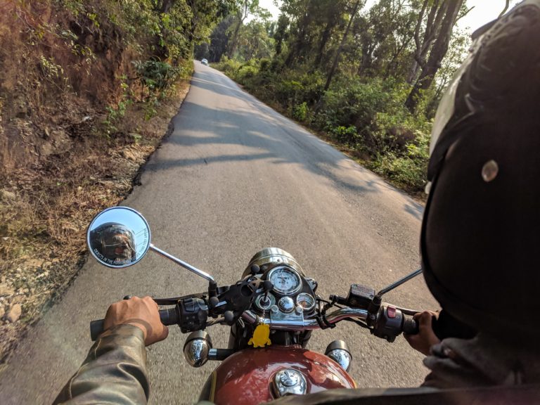 riding a classic motorcycle